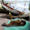 A child grabs sleep wherever possible after a long day of labor in West Africa’s struggling fishery.