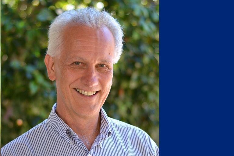 Headshot of Nicholas J. Mills