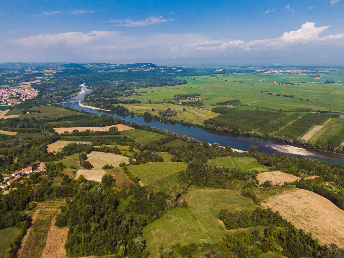 An aerial photo of a agricultural region, with various farmed plots of land distinctly visible.
