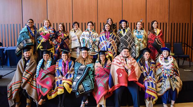 Students from UC Berkeley’s American Indian Graduate Program commencement celebration in 2019